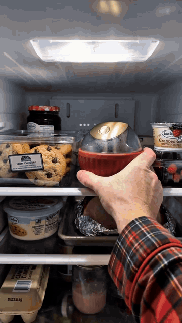 A mini ice-cream maker enjoyed beside a cosy Christmas fireplace